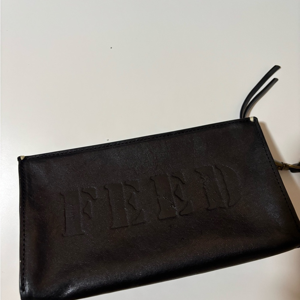 Black FEED wristlet